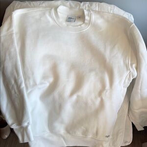 Excellent sweatshirt. TNA cozy fleece white sweatshirt